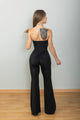 Mono Negro Corte Sexy con Detalles Dorados