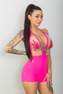 Body corto rosa con transparencias y bordados florales