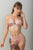 Bikini rosa con lentejuelas y tiras cruzadas