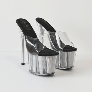 Tacón tipo mule de plataforma extrema con diseño futurista y llamativo 17cm